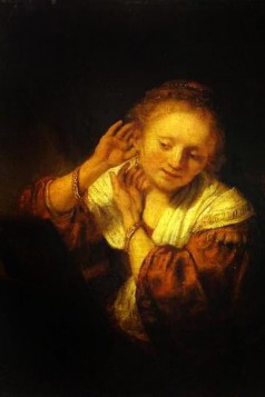 A Young Woman Trying on Earings
